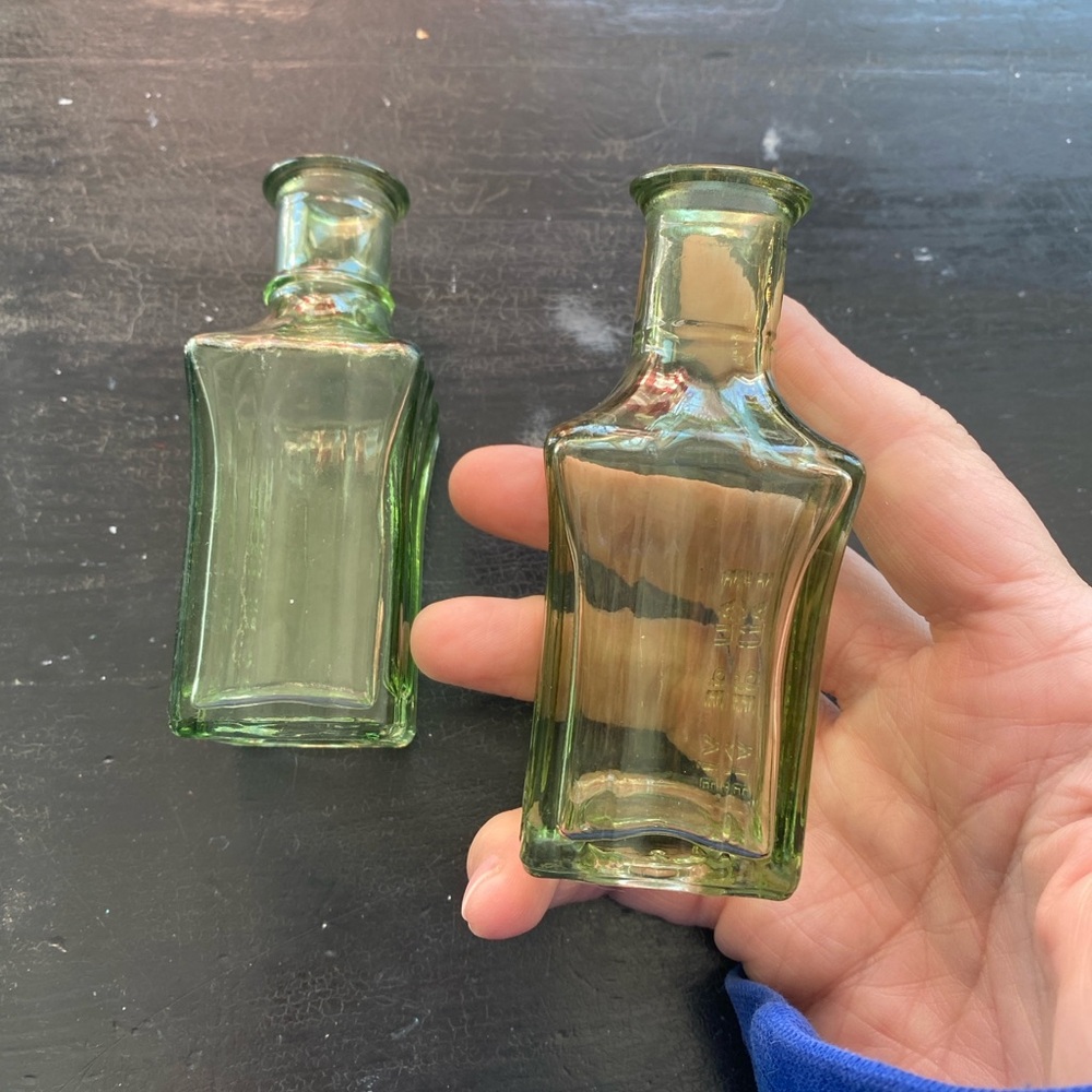 two vintage green glass bud “eau de vie”
